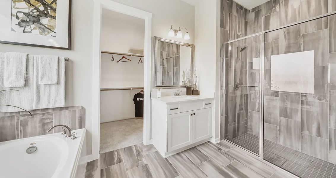 Representative furnished interior of a home built from the Lynnbrook by Chesmar Homes in Sienna Chateau, Missouri City (Image 8).