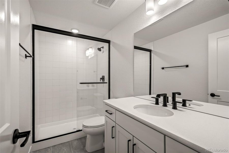 Furnished interior view inside a new home in Wolf Ranch - Enclave Collection, Colorado Springs (Image 12).