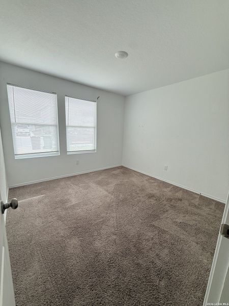 Spacious, unfurnished interior of a new home in Crescent Hills: Stonehill Collection, San Antonio (Image 8).