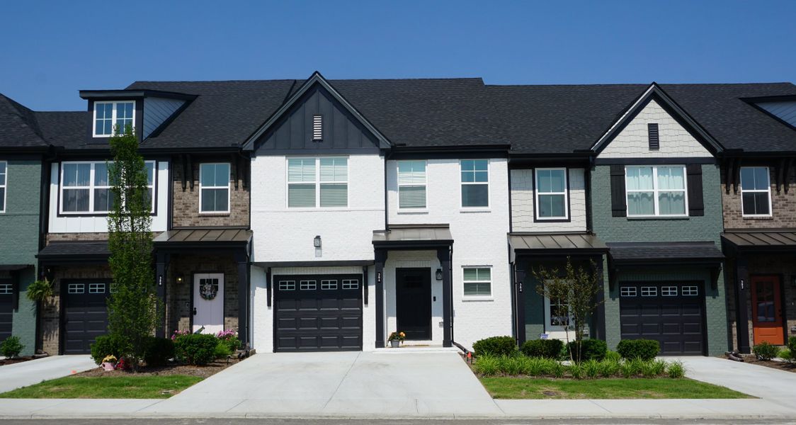 Front exterior of a new home in Oxford Station, Gallatin, TN, highlighting curb appeal (Image 2). Front exterior of a new home in Oxford Station, Gallatin, TN, highlighting curb appeal (Image 2).