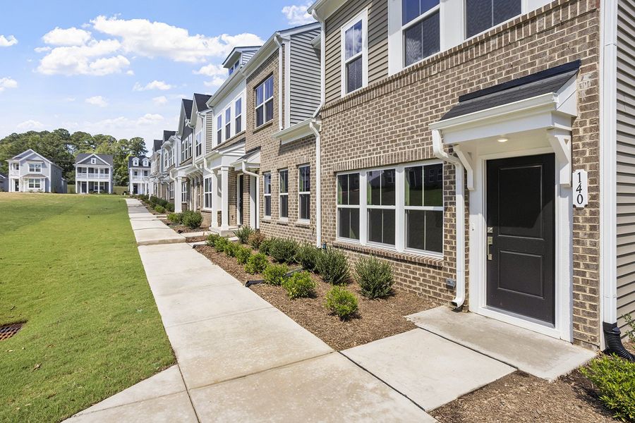 Exterior details and patio area of a home in Renaissance at White Oak, Garner (Image 3). Exterior details and patio area of a home in Renaissance at White Oak, Garner (Image 3).