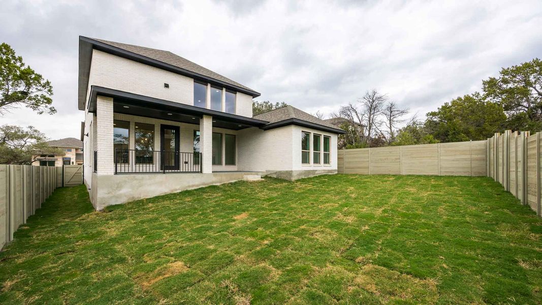 Exterior details and patio area of a home in Wolf Ranch 51', Georgetown (Image 2).