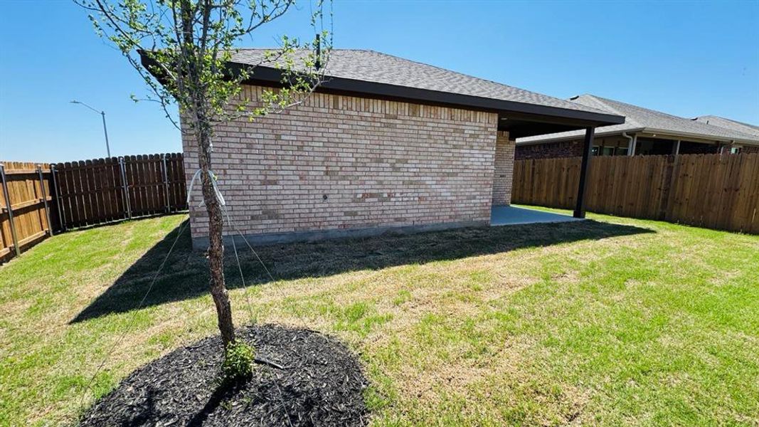 Front exterior of a new home in Meadowbrook Estates, Cleburne, TX, highlighting curb appeal (Image 2). Front exterior of a new home in Meadowbrook Estates, Cleburne, TX, highlighting curb appeal (Image 2).