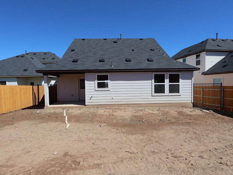 Exterior details and patio area of a home in Cascades at Onion Creek, Austin (Image 3).