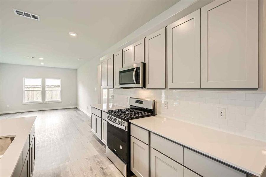 Furnished interior view inside a new home in Prestige Collection at Overland Grove, Forney (Image 11).