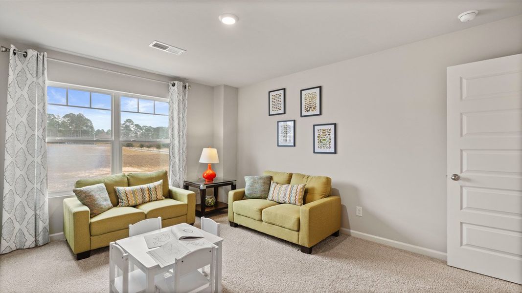 Representative furnished interior of a home built from the Mansfield by D.R. Horton in Estates at Deer Hollow, Grovetown (Image 30).