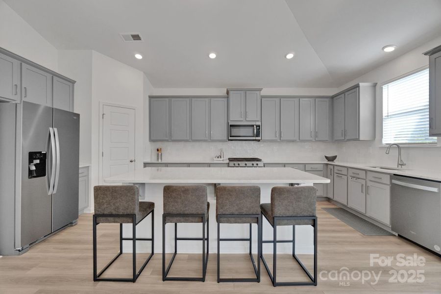 Furnished interior view inside a new home in The Hills, Huntersville (Image 8).