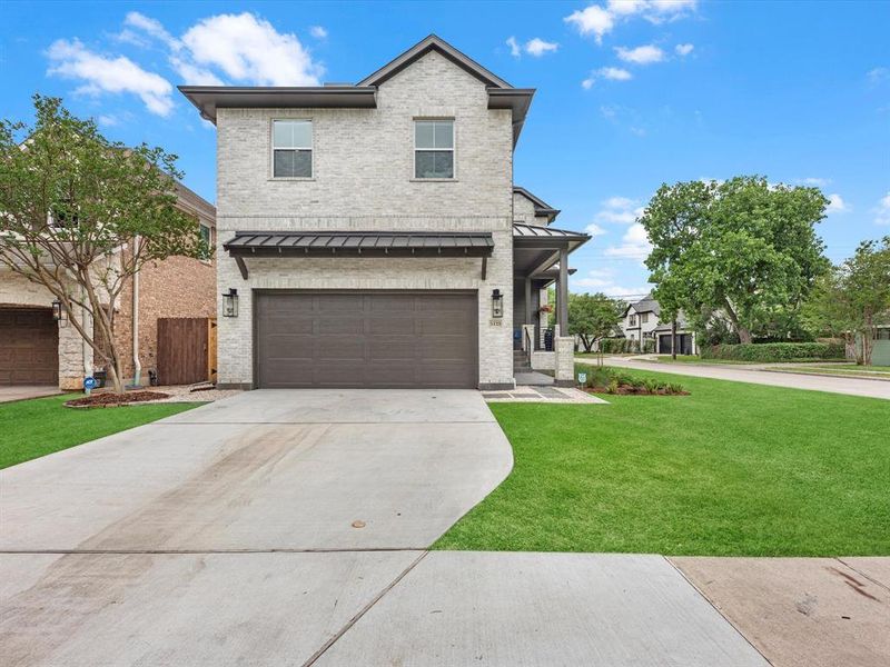 The roomy driveway lends an ideal entrance and exit to and from the residence.