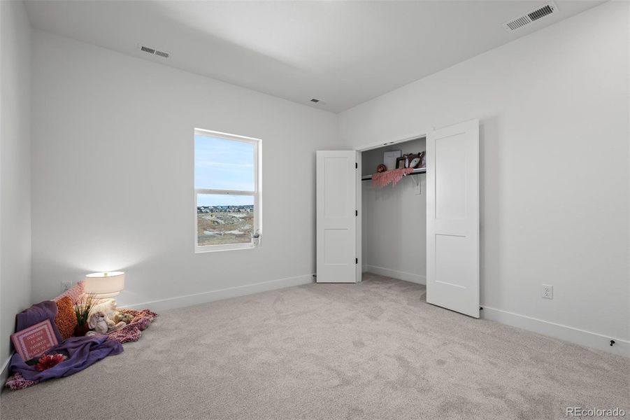 Spacious, unfurnished interior of a new home in Revel Crossing at Wolf Ranch - The Panorama Collection, Colorado Springs (Image 26).