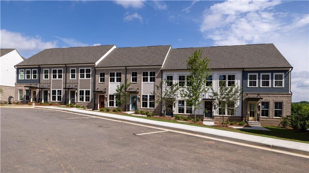 Front exterior of a new home in Skylar, Atlanta, GA, highlighting curb appeal (Image 21).