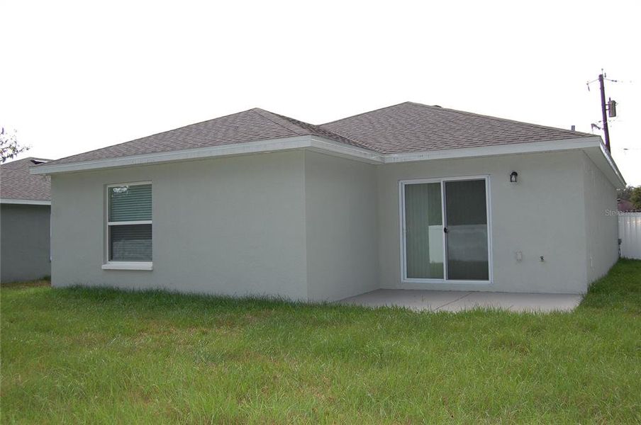 Front exterior of a new home in , Lakeland, FL, highlighting curb appeal (Image 2).