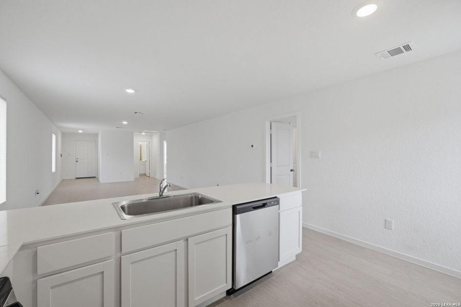 Furnished interior view inside a new home in Rose Valley, Converse (Image 9).