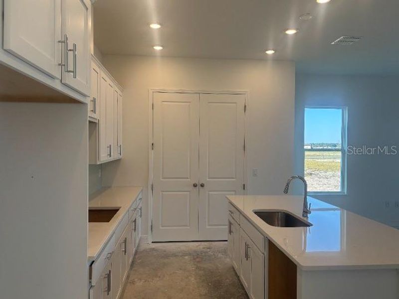 Furnished interior view inside a new home in Ardisia Park Estate, New Smyrna Beach (Image 12).