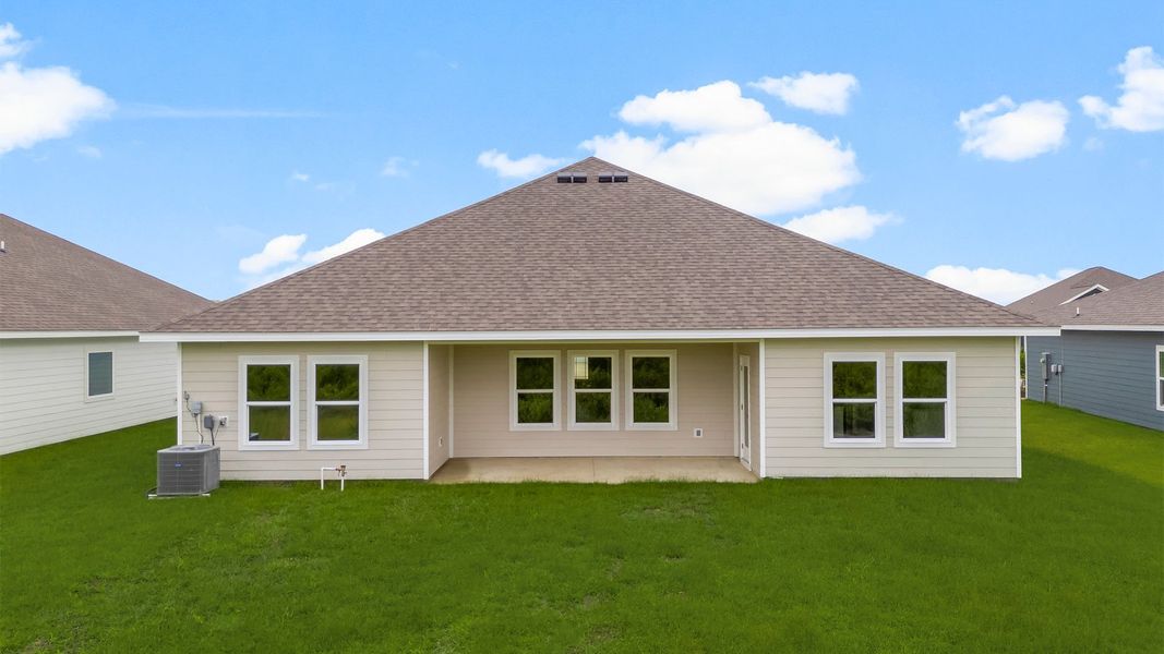 Front exterior of a new home in Liberty, Panama City, FL, highlighting curb appeal (Image 20). Front exterior of a new home in Liberty, Panama City, FL, highlighting curb appeal (Image 20).