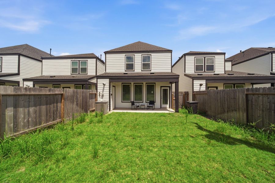 Exterior details and patio area of a home in , Houston (Image 4).