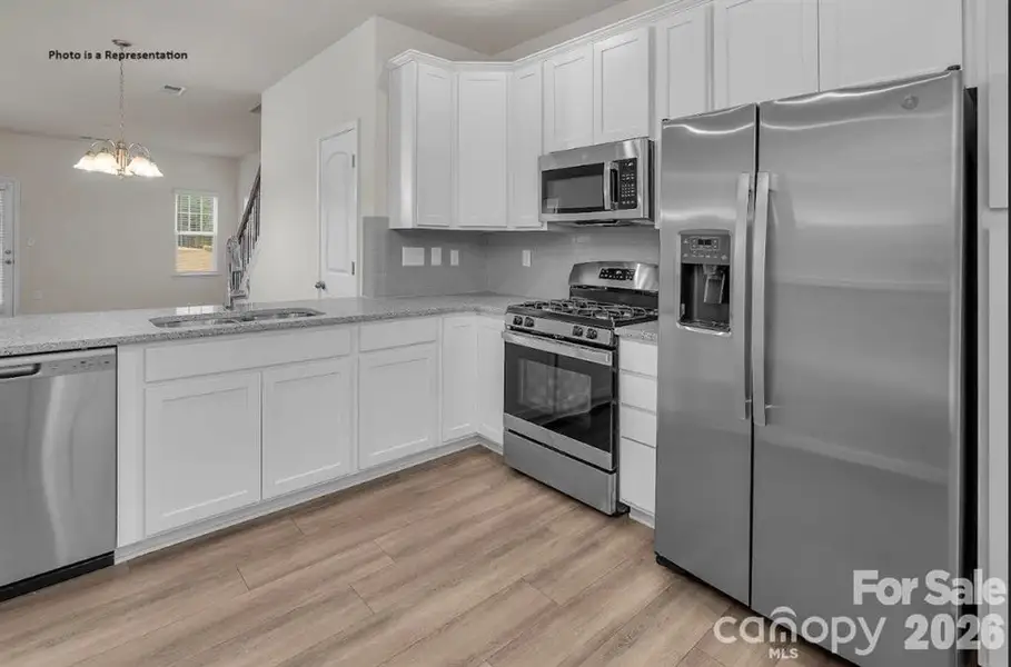 Furnished interior view inside a new home in Autumn Brook, Staley (Image 4).