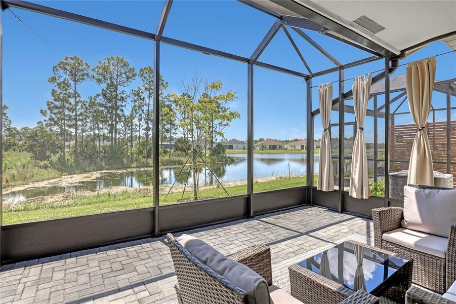 Exterior details and patio area of a home in The Timbers at Everlands, Palm Bay (Image 22).