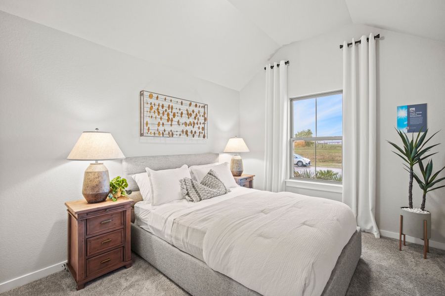 Bedroom in a Trinity Ranch Diamond Model in Elgin TX by Trophy Signature Homes