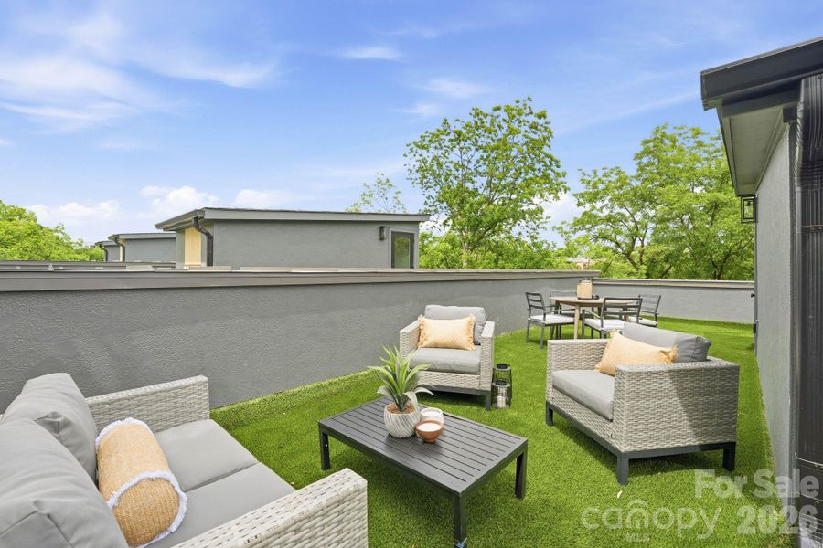 Rooftop terrace with Uptown Charlotte skyline views. Rooftop terrace with Uptown Charlotte skyline views.