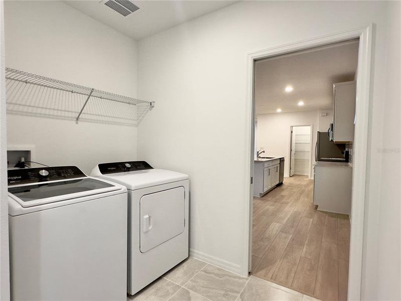 Furnished interior view inside a new home in Parkside Trails, Clermont (Image 15).