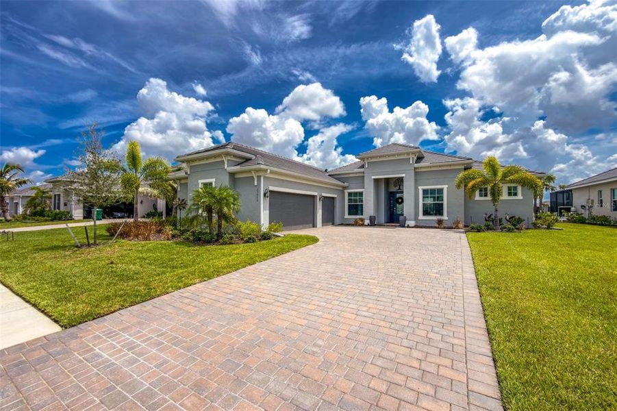 Front exterior of a new home in , Punta Gorda, FL, highlighting curb appeal (Image 27). Front exterior of a new home in , Punta Gorda, FL, highlighting curb appeal (Image 27).