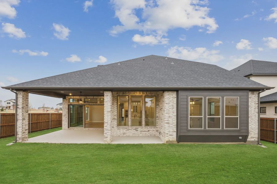 Exterior details and patio area of a home in The Grove Frisco, Frisco (Image 2). Exterior details and patio area of a home in The Grove Frisco, Frisco (Image 2).