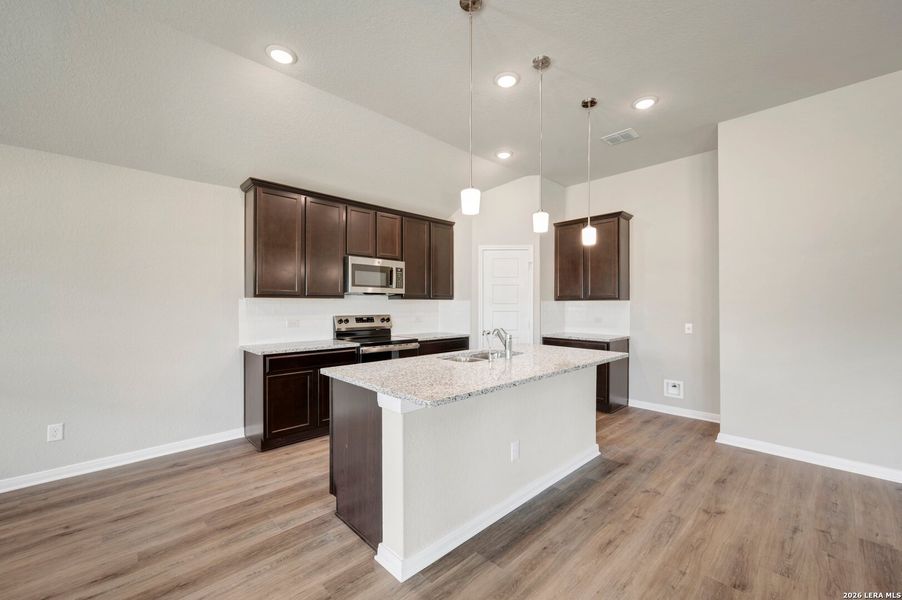 Furnished interior view inside a new home in Greenspoint Heights, Seguin (Image 4).