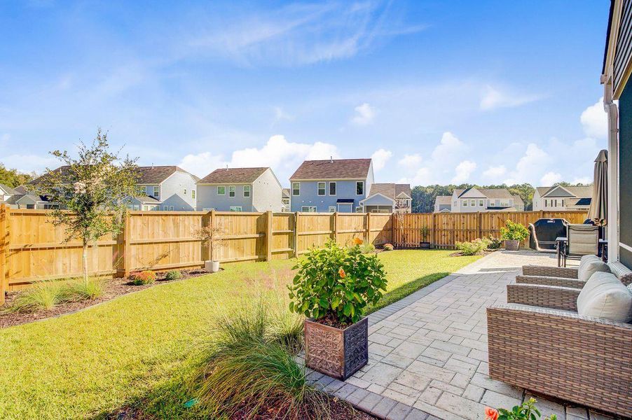 Exterior details and patio area of a home in Oakley Pointe, Moncks Corner (Image 4).