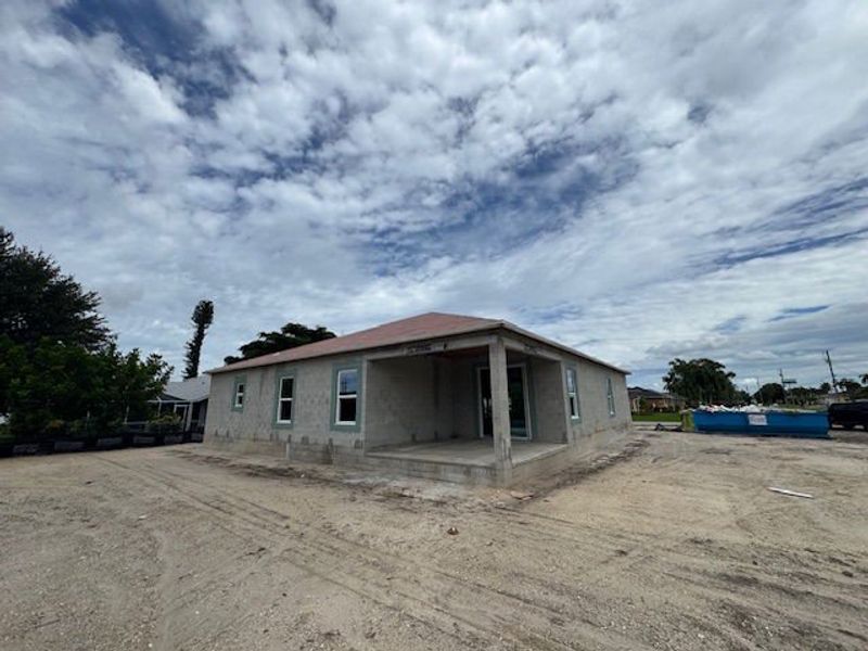 Front exterior of a new home in Cape Coral, Cape Coral, FL, highlighting curb appeal (Image 2).