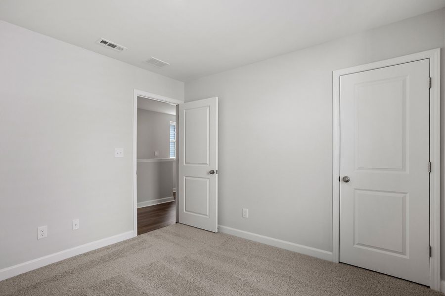 Spacious, unfurnished interior of a new home in Renaissance at White Oak, Garner (Image 23).