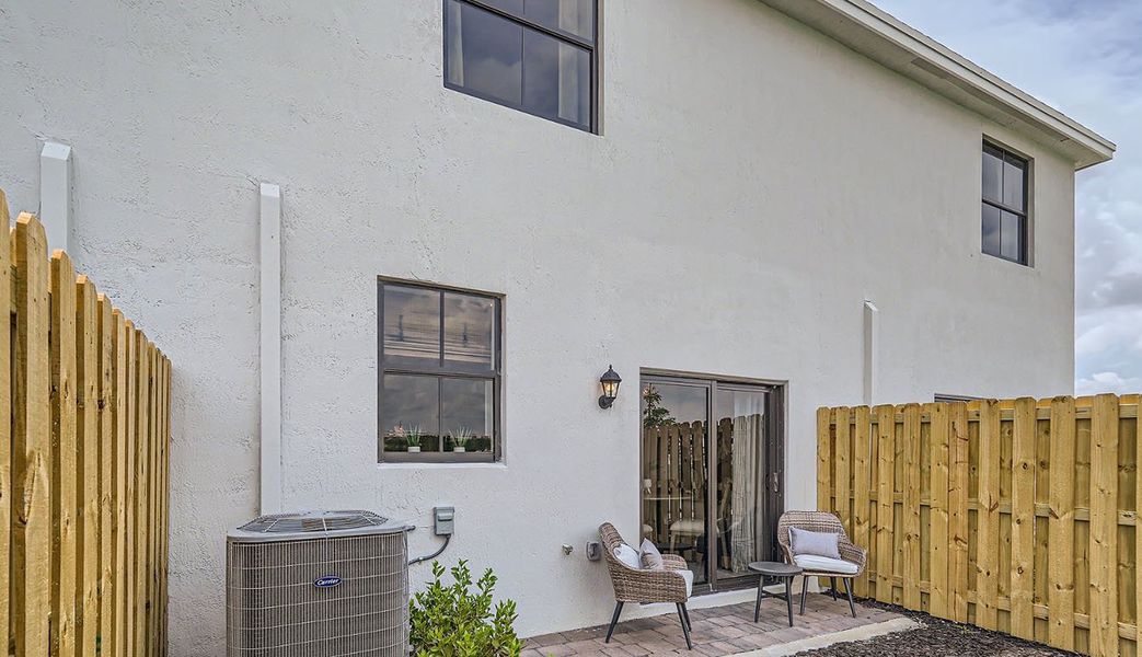 Exterior details and patio area of a home in Palm Cay, Florida City (Image 20).