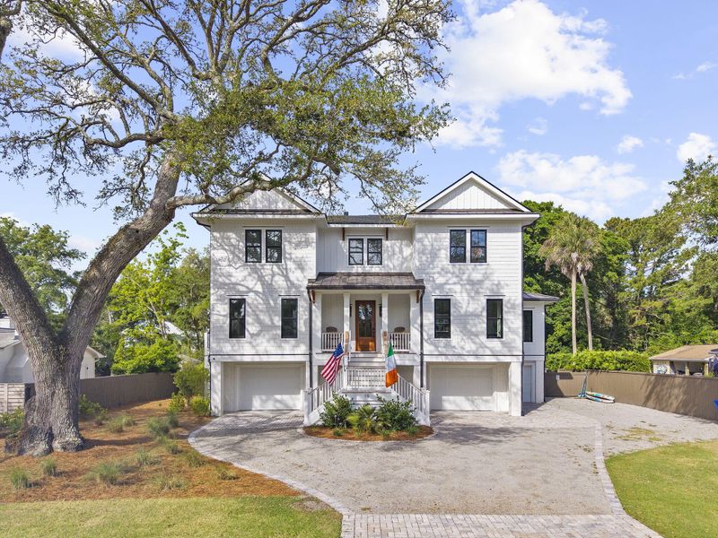 Front exterior of a new home in , Isle Of Palms, SC, highlighting curb appeal (Image 26). Front exterior of a new home in , Isle Of Palms, SC, highlighting curb appeal (Image 26).