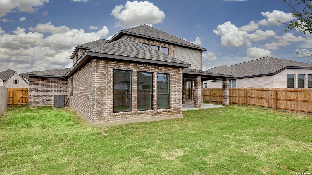 Exterior details and patio area of a home in Alsatian Oaks, Castroville (Image 4).