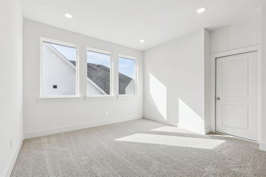 The upstairs loft space makes a perfect homework area for the kiddos or an additional family living space.