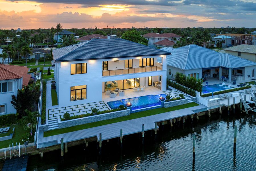 Front exterior of a new home in , North Palm Beach, FL, highlighting curb appeal (Image 2).