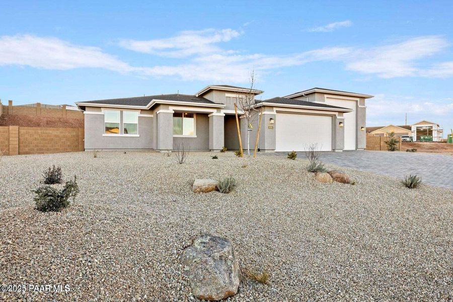 Front exterior of a new home in Morningstar, Prescott Valley, AZ, highlighting curb appeal (Image 5).