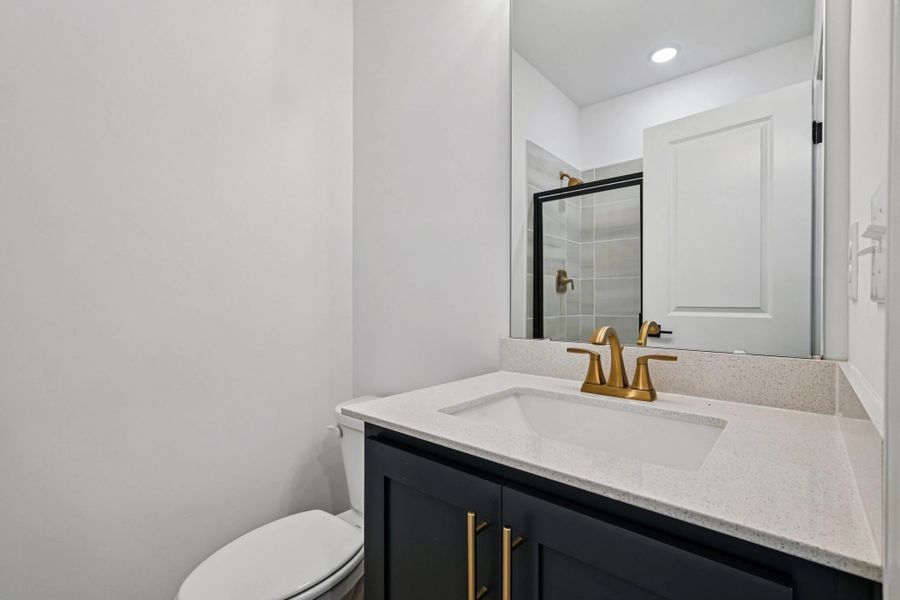 Guest Bath featuring the AW Collection® Sapphire - High-contrast finishes add bold energy. Guest Bath featuring the AW Collection® Sapphire - High-contrast finishes add bold energy.