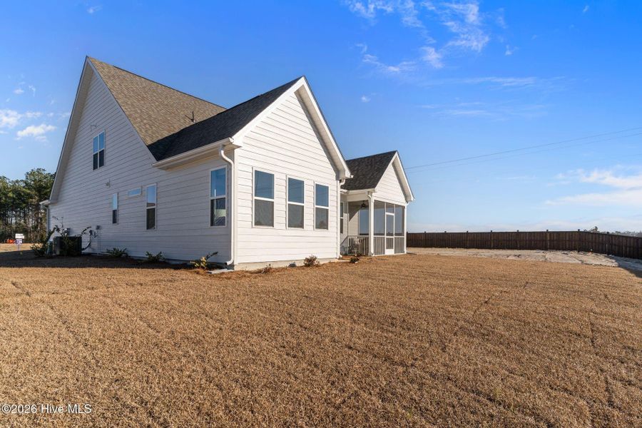 Exterior details and patio area of a home in Terrapin, Leland (Image 31).
