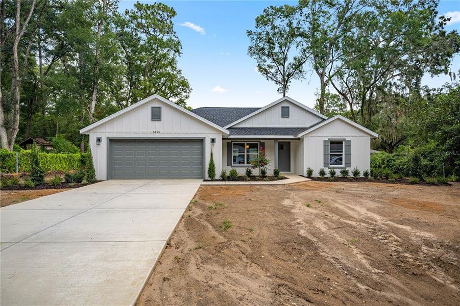 Front exterior of a new home in , Ocala, FL, highlighting curb appeal (Image 17).
