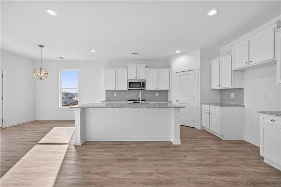 Furnished interior view inside a new home in Sutton's Landing, Statham (Image 5).