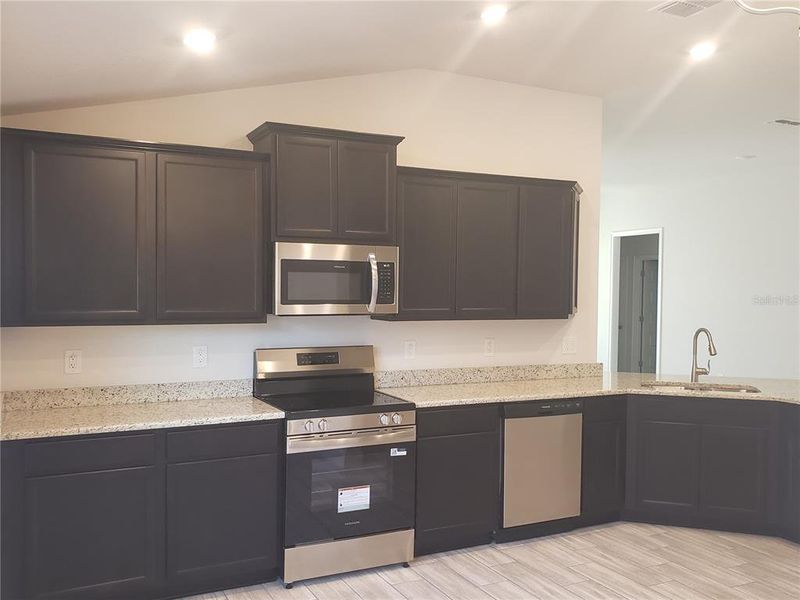 Furnished interior view inside a new home in Pine Bluff, Spring Hill (Image 3). Furnished interior view inside a new home in Pine Bluff, Spring Hill (Image 3).