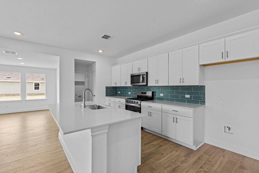 Furnished interior view inside a new home in Railhead, Cedar Creek (Image 6).
