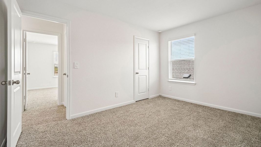 Spacious, unfurnished interior of a new home in Revelry, Del Valle (Image 31).