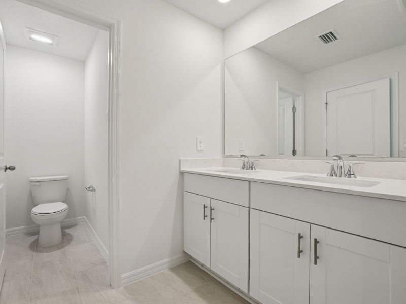 Furnished interior view inside a new home in Bradford Park, Ormond Beach (Image 9).