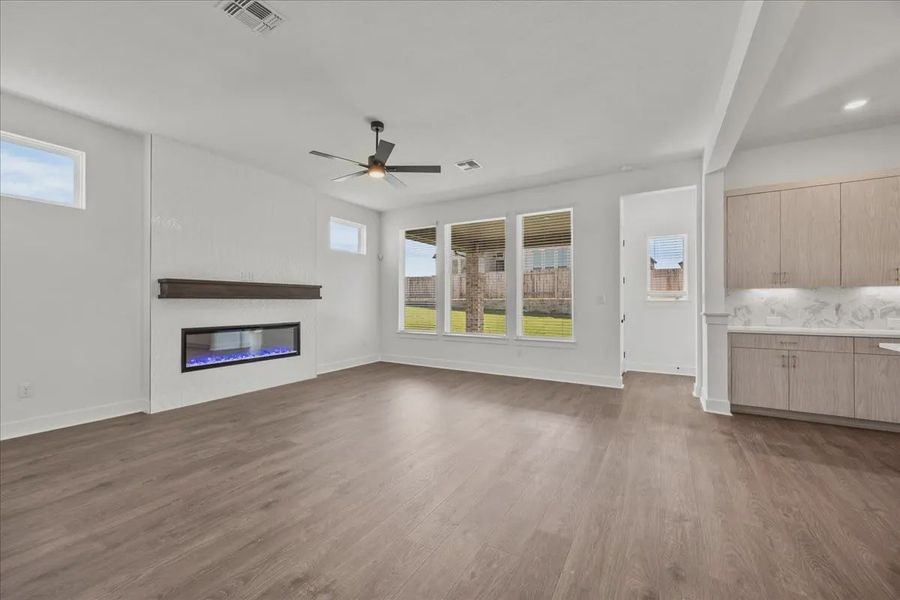 Representative unfurnished interior of a home built from the Courtney by Chesmar Homes in 6 Creeks, Kyle (Image 9).