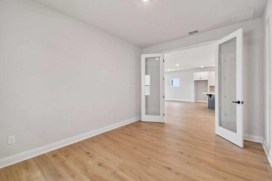 Representative unfurnished interior of a home built from the The Northglen by David Weekley Homes in Palmeras at Crossprairie – The Grove Collection, St. Cloud (Image 9).