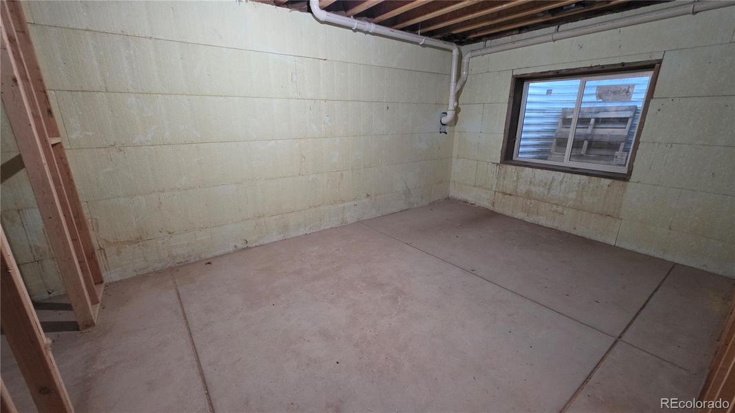 Unfinished basement bedroom Unfinished basement bedroom