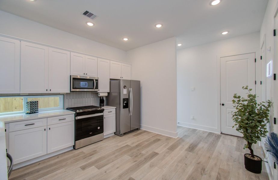 Furnished interior view inside a new home in Benson Street Court, Houston (Image 7).