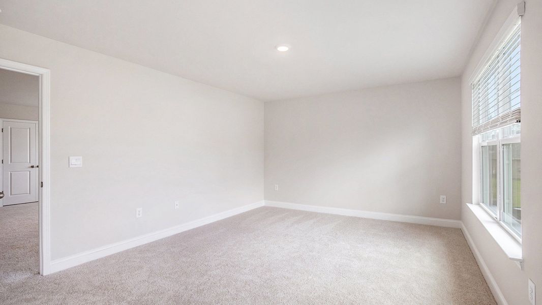 Spacious, unfurnished interior of a new home in Auberon Woods, Conway (Image 20).