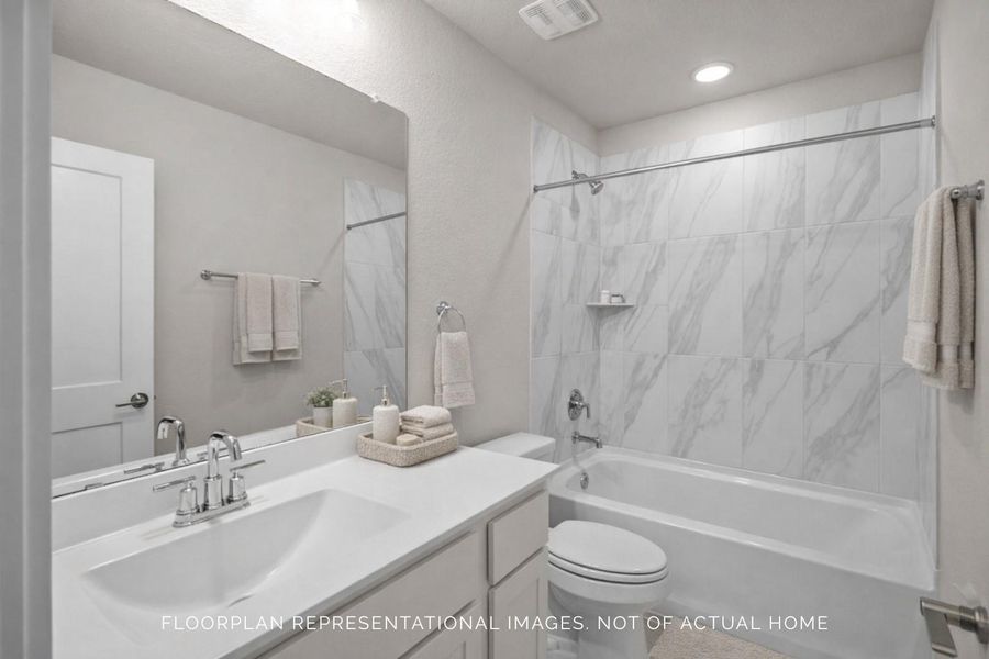 Furnished interior view inside a new home in Sorella, Tomball (Image 8).